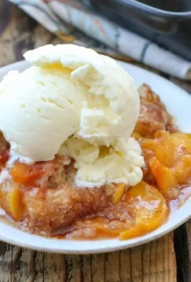 Delicious homemade peach cobbler with fresh peaches in a baking dish