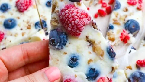Delicious frozen yogurt bark topped with fruits and nuts