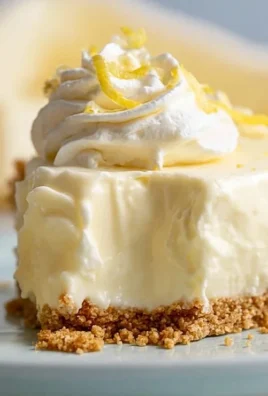Irresistible no bake lemon pie topped with lemon slices and whipped cream