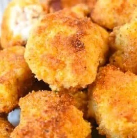 Plate of crispy Keto Chicken Nuggets with dipping sauce