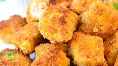 Plate of crispy Keto Chicken Nuggets with dipping sauce