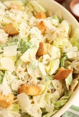 Delicious and colorful Pasta Caesar Salad served in a bowl