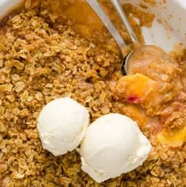 Delicious homemade Peach Crisp served in a bowl