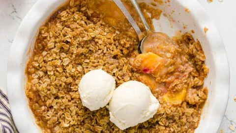 Delicious homemade Peach Crisp served in a bowl