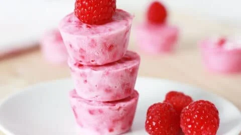 Delicious raspberry frozen yogurt bites served in a bowl.