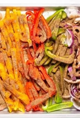 Delicious sheet pan chicken fajitas with colorful peppers and onions