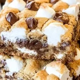 Delicious S'mores Cookie Bars topped with chocolate and marshmallows