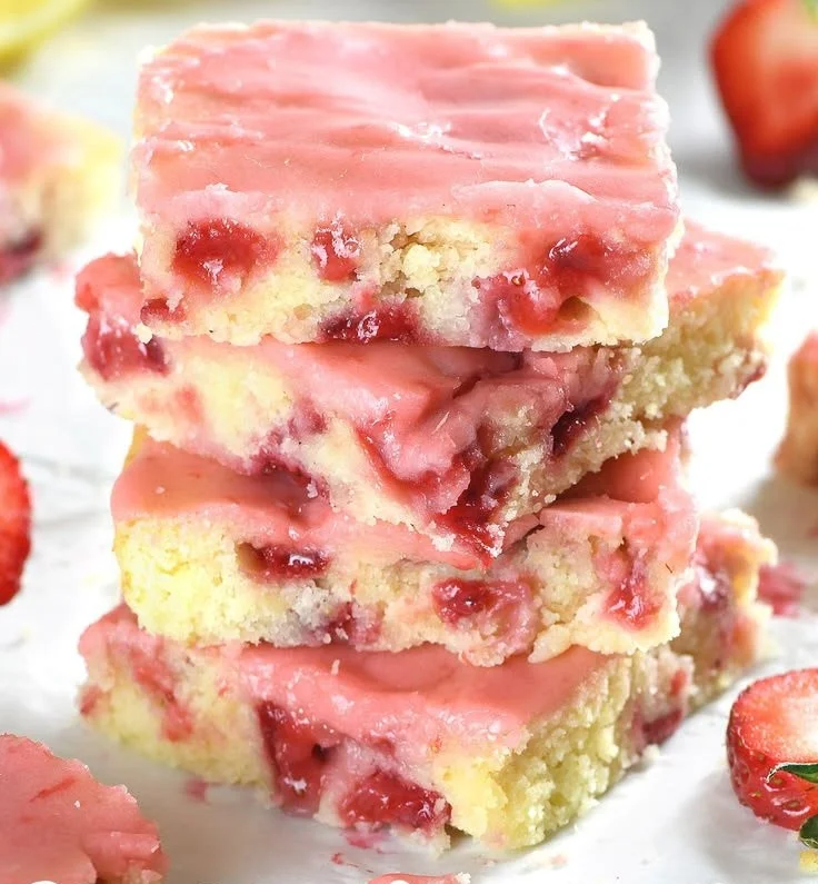 Delicious strawberry lemon blondies topped with fresh strawberries and lemon zest