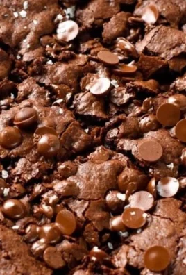 Delicious sugar-free brownies on a wooden table, perfect for diabetic-friendly diets.