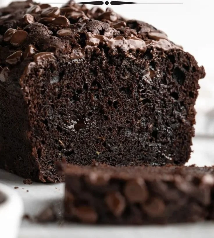 Delicious triple chocolate chip zucchini bread with melted chocolate chunks